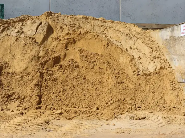 Builder's sand piled at the Bundoora yard