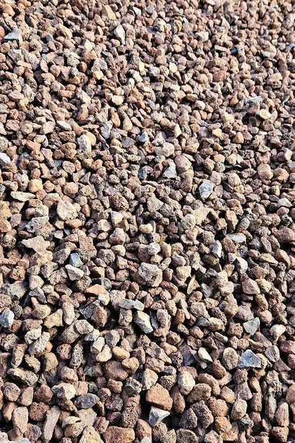 Scoria in a bulk bay at the Bundoora yard, used for drainage and garden beds